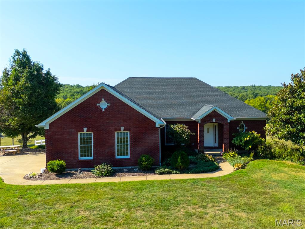 Custom home on 32 acres with a 1/4-mile driveway providing complete privacy with sunny southern exposures and beautiful sunrises and sunsets.
New roof completed August 2025.
This 2634+ square foot home with attached 2 car garage includes three large bedrooms with the master bedroom and bath, the living room, dining room, chef's kitchen with custom made butternut cabinets, breakfast nook, a 1/2 bath and laundry room all on the main floor. The other two bedrooms, large family room with its own kitchenette, a second full bath, a small office (can be 4th tiny bedroom) are on the lower level which opens out to the in-ground fiberglass pool with automatic cover (swim April to October) and the wood fired sauna. The outbuildings include a 28 x 32 Shop with 10' high garage door, a garden greenhouse shed with potting bench, sheep shed, woodshed with electric wood splitter and an unfinished 14 x 14 bonus building for your imagination. This farm currently supports a small flock of sheep, herding dogs, a large garden, long walks, peace and quiet, Come take a walk!
More acreage available!