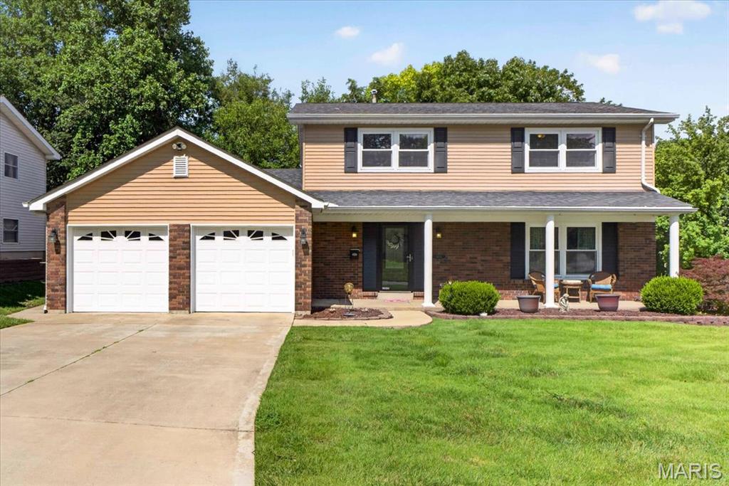 Tucked away on a corner lot in an established St. Charles neighborhood, this 2,490-square-foot, 4-bedroom, 2 full-/2 half-bath home balances modern updates with everyday functionality. The main level flows effortlessly from the light-filled family room—complete with recessed lighting—into an updated kitchen featuring granite countertops, stainless steel appliances, and a gas range. From there, French doors open directly to a covered deck and a fenced, shaded backyard, making indoor-outdoor entertaining seamless. Upstairs, the four bedrooms include a primary suite with an updated private bath, alongside a secondary bathroom refreshed with new flooring and a tub surround. The living space extends into the partially finished, carpeted lower level, which offers a versatile footprint for a recreation room, built-in storage, and a convenient half bath. Beyond its fresh, neutral aesthetic, this home is built for long-term peace of mind. High-ticket updates include a garage door replaced within the last year, an Ecobee thermostat, a newer water heater, newer sump pump and a newer HVAC system backed by a transferable warranty with approximately 13 years remaining. Features a convenient laundry shoot! A clear sewer lateral inspection has already been completed and will be provided upon contract. Don't miss your opportunity to make this move-in ready home yours!