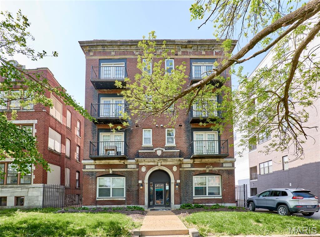 Nestled in a stunning historic brick building just minutes from the world-class amenities of Forest Park, this beautifully updated apartment offers the perfect blend of character and convenience. The unit features gleaming hardwood floors throughout, a fully equipped kitchen with rich dark cabinetry, granite countertops, subway tile backsplash, and black appliances ideal for anyone who loves to cook and entertain. Step out onto your private balcony to enjoy treetop views of the vibrant neighborhood, or let the light pour in through large windows and French doors that give the living space an open, airy feel. Best of all, a full-size Samsung washer and dryer are stacked right in the unit, so laundry day has never been more convenient.
Beyond the apartment itself, this address puts you in the heart of one of St. Louis's most sought-after corridors. Forest Park home to the St. Louis Zoo, Art Museum, outdoor trails, and seasonal events is right at your doorstep. The building's gorgeous classical facade with ornate stonework and iron-railed balconies adds curb appeal that's hard to find at this price point. With ample closet space, in-unit laundry, a private balcony, and a walkable location close to dining, shopping, and culture, this apartment is an exceptional value at $1095/month. Schedule your showing today before it's gone!

Owner pays for Water/Sewer/Trash, Tenant responsible for Gas and Electric + their choice of internet/cable provider.