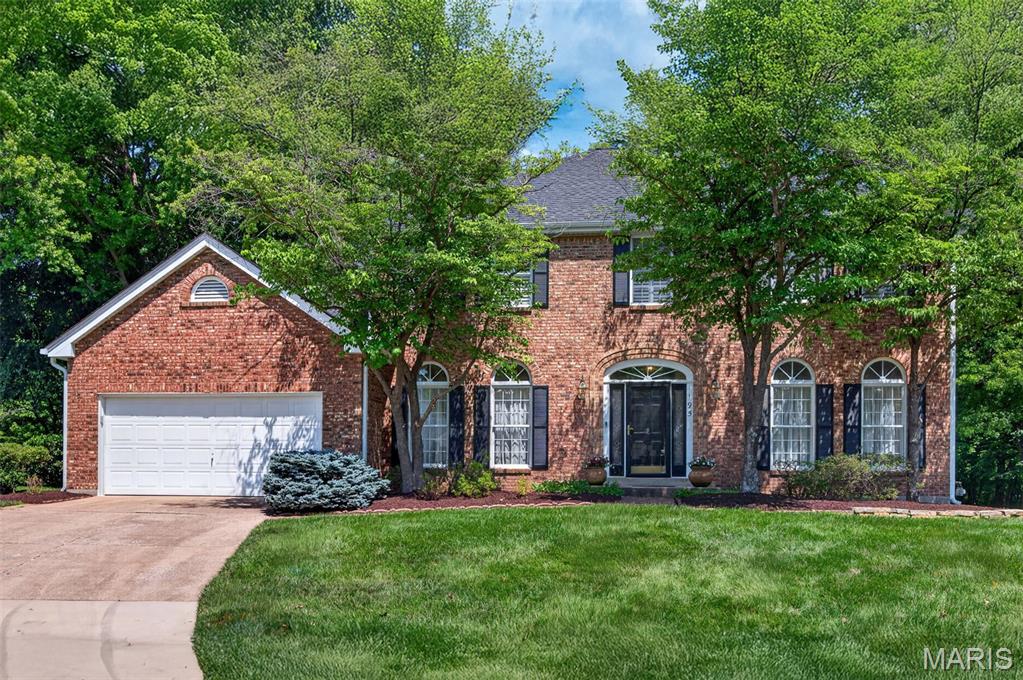 A stately brick front elevation welcomes you to 195 Muirfield Forest Ct, nestled in the highly desirable Muirfield community—complete with a neighborhood swimming pool, the community hosts swim meets, holiday celebrations, and invites you to enjoy relaxing weekends with friends and neighbors. 

Inside, the expanded floor plan boasts custom millwork, rich hardwood flooring, tall ceilings, and a beautifully finished lower level. The spacious great room is perfect for quiet evenings or effortless hosting, featuring a wet bar, a cozy gas fireplace, and a wall of windows that floods the space with natural light while offering access to the patio and tree-lined private backyard.

Culinary enthusiasts will love the kitchen, equipped with dual ovens, ample counter and cabinet space, two pantries, and a dedicated planning desk. Just off the breakfast room, French doors open to your new favorite morning coffee spot: a large screened porch with serene, private views. The main floor is rounded out by formal living and dining rooms, a powder room, and a generous sized laundry/mudroom.

Upstairs, the expansive primary suite features custom plantation shutters, a large walk-in closet, and a sun-drenched en-suite bath with dual vanities, a soaking tub, and a separate shower. Three additional generously sized bedrooms share a well-appointed full bath.

The finished lower level adds incredible versatility with a large family room, an office/den, flex space, exercise room, and a dedicated workshop area for hobbyists—all while preserving plenty of storage space. Enjoy premium living with easy access to schools, highways, shopping, parks, and dining!