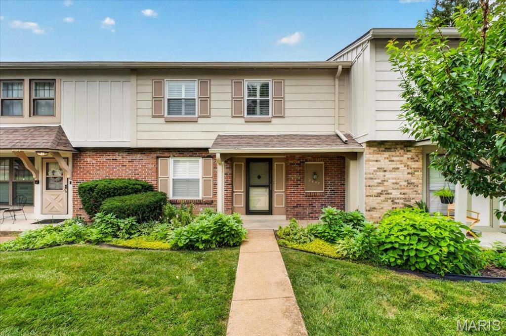 Welcome to 2427 Hidden Meadow Lane in Ballwin! This move-in-ready 2-bedroom, 2.5-bath condominium offers 1,320 square feet of comfortable living space with beautiful wood floors, brand-new carpet, and fresh paint throughout. The spacious layout is perfect for everyday living and entertaining, while the unit's location backing to common ground and the community tennis courts provides a private, peaceful view. Conveniently located near shopping, dining, parks, and major highways, this home is truly move-in ready and waiting for its new owner!