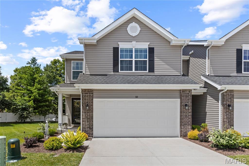 Welcome to this spacious end-unit town home in St. Peters! Built in 2024, you'll have the peace of mind of new construction, plus your lawn and landscaping maintenance is covered! The foyer opens to the bright and open layout of the main living space. You'll love the abundance of natural light as well as the luxury vinyl plank flooring that ties the living room and kitchen together. Enjoy hosting gatherings in the dining room leading into the kitchen with a breakfast bar, quartz counters, 42" cabinets, a tile backsplash, and black slate appliances. A half bath with a pedestal sink completes the main level. Upstairs, the primary bedroom features an en-suite bathroom with step-in shower, large vanity and stylish lighting, plus a walk-in closet. Two more bedrooms, another full bathroom, and a convenient laundry room round out the space. The basement adds room for storage and has an egress window for your future finishes. Spend summer grilling and relaxing with friends and family on the large patio overlooking the spacious backyard and trees beyond. In a great location, you'll be just moments from Ft. Zumwalt Schools, I-70, shopping, restaurants, and parks. Don't miss out on this one!