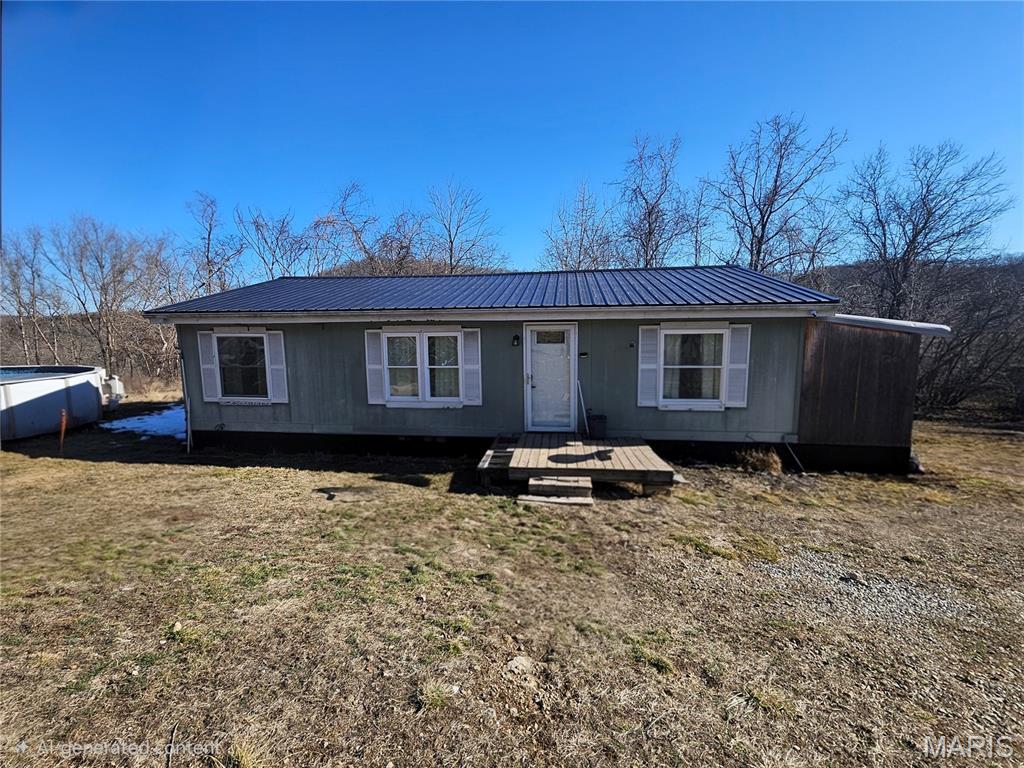 This inviting 4 acre property offers a rare setup with two well-maintained manufactured homes perfect for multi-generational living, extended family, or investment potential. Rent one and supplement your mortgage!

The double-wide features 2 comfortable bedrooms and 1.5 baths, while the single-wide provides 2 bedrooms and 1 full bath. Both homes are in good condition and thoughtfully positioned for care and convenience of one another. 

Located in the desirable Waynesville R-VI School District, this property blends space, versatility, and privacy in a setting that is both practical and welcoming.