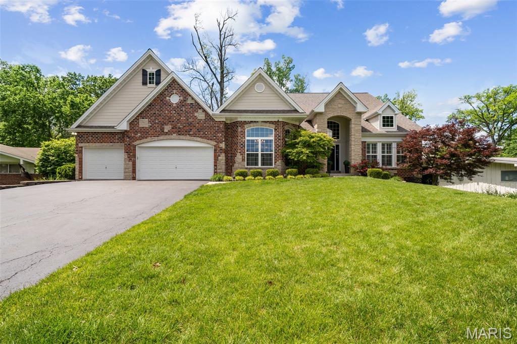 Nestled in sought-after Harwood Hills in Des Peres, this sophisticated 4-bedroom, 3.5-bath home offers the rare combination of newer construction, spacious design, and an unbeatable location. The home features a bright open layout with an eat-in chef’s kitchen that opens to a large formal dining room and a living room with custom built-in bookcases. Upstairs, the primary suite provides a relaxing escape with a spa-like bath and generous closet space. Additional bedrooms are well-sized and versatile, and the finished walk out lower level offers extra room including a family room with wet bar, bedroom, and full bath. The back yard boasts a large patio with a pergola and an expansive grassy area. Enjoy the convenience of being minutes from parks, restaurants, shopping, and award-winning schools, all while living in one of St. Louis County’s most desirable communities.