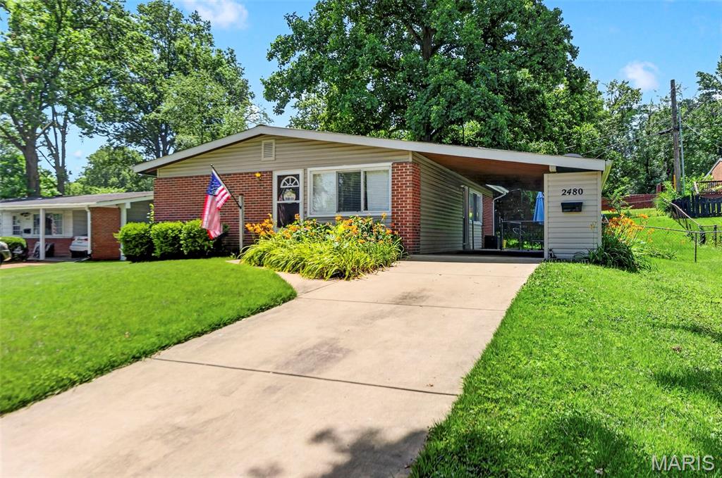 Welcome Home! This great ranch home with 3 bedrooms and 2 baths with finished lower level offers over 1800 sq ft of finished space. Settled in a lovely Florissant neighborhood with easy access to shopping, restaurants, highways and schools. You won't find carpet in this house! It offers updated wood floors throughout including the basement, neutral paint, upgraded lighting, SS appliances and more. The great curb appeal and landscaping are tasteful and inviting. The front door opens to the bright living room. The eat in kitchen with plenty of storage offers access to the carport and fenced backyard.The 3 spacious bedrooms on the main level share the hall bath. Downstairs for more living space, a full bath and plenty of storage in the mechanical/laundry room. This one is ready- unpack your boxes- you are HOME.