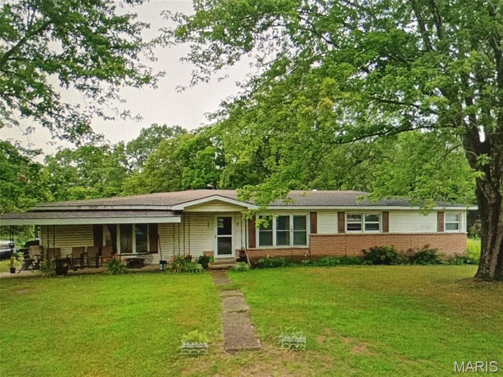 VIP 5044 Ranch home with a double lot 200 x 270 (1.24 acres m/l) in Brandon Heights subdivision with 3 bedrooms and one bath home Large living room and a large family room, central heat and air.  Backs up to City of Salem Ballpark public area. Has Salem R-80 school district and is in city limits with city utilities. Home has just been mostly interior repainted with primer inside for the exception of the large family room. New flooring in all three bedrooms. Comes with range and refrigerator and has hardwood cabinets and eat in kitchen and utility room.  Dining area could be opened up to make a sliding door and back porch for outside entertainment.  Has an outside detached carport as well.
This is an estate sale and is being sold as is.  Check this out before it gets away from you.  Call to make your appointment today!