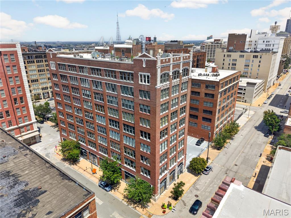 Experience downtown loft living in Unit #705 at 1627 Locust Street. This printers loft condominium offers approximately 1,267 square feet of open living space with 2 full bathrooms and a flexible loft-style layout. Features include expansive windows, exposed brick accents, high ceilings, and an open-concept living and kitchen area. The kitchen is equipped with modern cabinetry and stainless steel appliances. Also enjoy rooftop outdoor space with city views. Conveniently located in the heart of Downtown St. Louis.