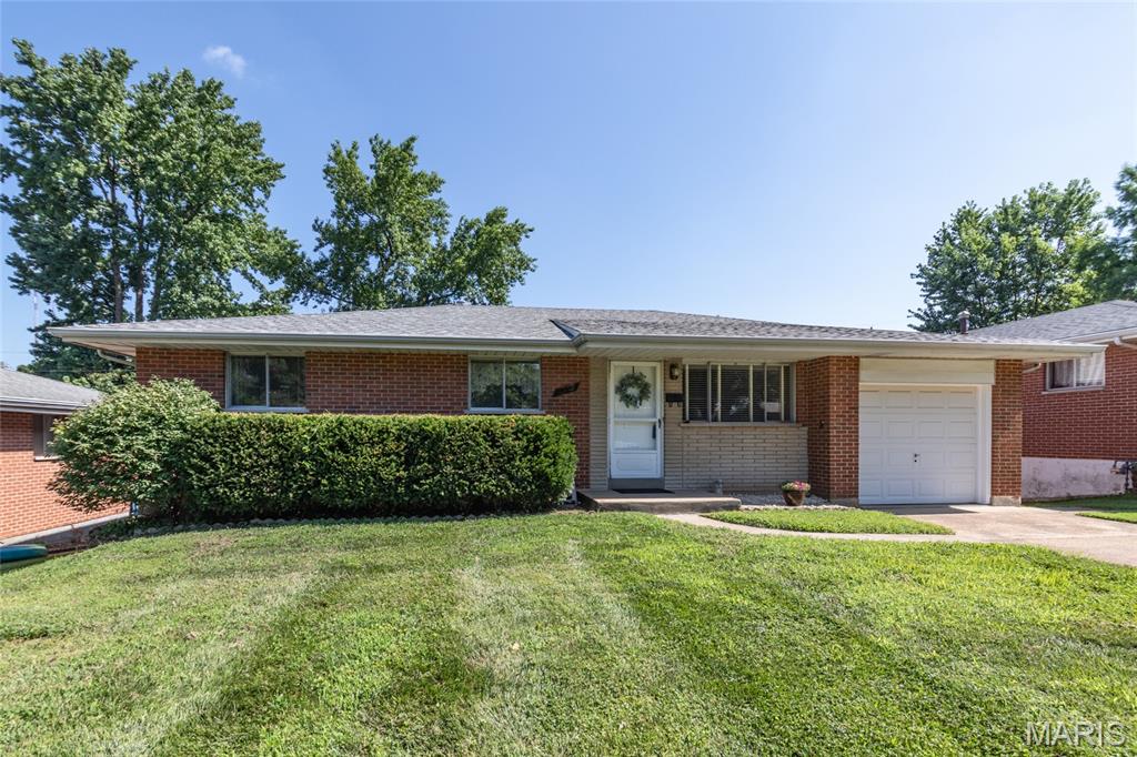 Showings start July 7. You will enjoy convenient living in this well maintained 3 bedroom 2.5 bath all brick ranch with 1-car garage. It is situated on a level fenced lot on a quiet cul-de-sac street near schools, shopping, restaurants, parks and recreational areas. The home features a low maintenance exterior, finished walk-out lower level with ample storage space, a large rec/family room, full bath, workshop and laundry/utility room. Neutral decor that has been freshly painted. Gleaming hardwood floors throughout except for vinyl floors in the large eat in kitchen and the multipurpose bonus room off kitchen. The kitchen and bathrooms are in a well maintained and serviceable condition while possessing a retro decor.  Also featured is a newer roof, furnace and central A/C (2025). The seller is including a refrigerator in kitchen, a chest freezer, electric dryer and piano in the lower level.  This home was built, occupied and maintained by the original owner. Seller is providing a one year home warranty to the buyer at closing.