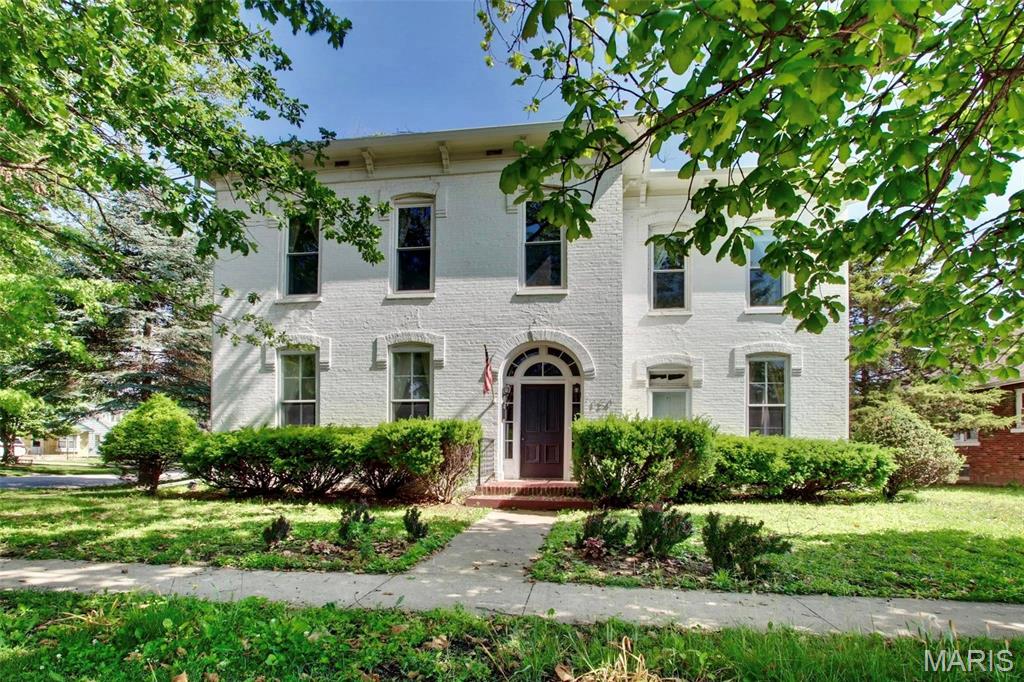 Welcome to the home that gives you the best of both worlds with much of its 1800's century charm mixed in with modern day upgrades! A truly captivating full brick, 3-bed 2 bath home which features a completely updated kitchen, spacious dining area, and beautiful exposed brick interior wall as soon as you walk through the front door! In this home you will find a lot of updated electrical features, new flooring on the main level & classic hardwood floors on the 2nd story, plus timeless and intricate details that are an in-person- must-see! The home conveys a basement, separate cellar space for storage, a perfectly sized concrete patio out the back door, plenty of yard, and an updated detached garage for your vehicle or workshop! Set your appointment to see this beauty in person!
