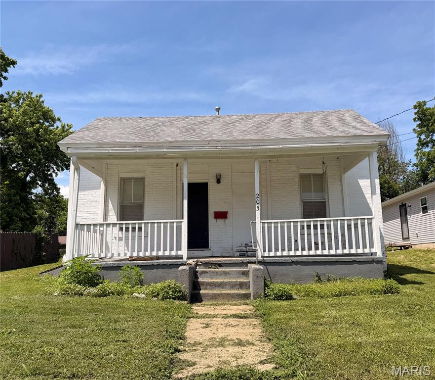 This conveniently located and affordable 3-bedroom, 1-bathroom home in downtown Fulton, Missouri offers the charm and character of a historic property, originally built in 1890. A covered front porch welcomes you home and leads into a spacious living room featuring a brick fireplace, perfect for setting a warm and cozy ambiance. The private backyard provides a wonderful space to relax, unwind, BBQ, or enjoy a casual game of catch.
Situated directly across from Fulton's Splash Pad, Memorial Park, and Stinson Creek Trail, this home offers quick and easy access to the outdoors. Memorial Park features picnic tables, a playground, restrooms, and is ADA accessible, along with a baseball field making it a perfect extension of your backyard.
This location also makes it an ideal fit for college enthusiast, with Westminster and William Woods Universities within easy walking or biking distance, and a beautiful park right outside the door for studying or unwinding between classes.
Whether you're looking for a place to call home or an income-producing investment, this property presents a great opportunity as a rental or investment property in a prime downtown Fulton Location, close to multiple local hotspots, businesses, universities, and other employers. 

Square footage is approximate; buyers should verify all measurements, room counts, online data, zoning, and school assignments independently. Prospective buyers, please ensure you have a preapproval letter or proof of funds ready before scheduling a showing.