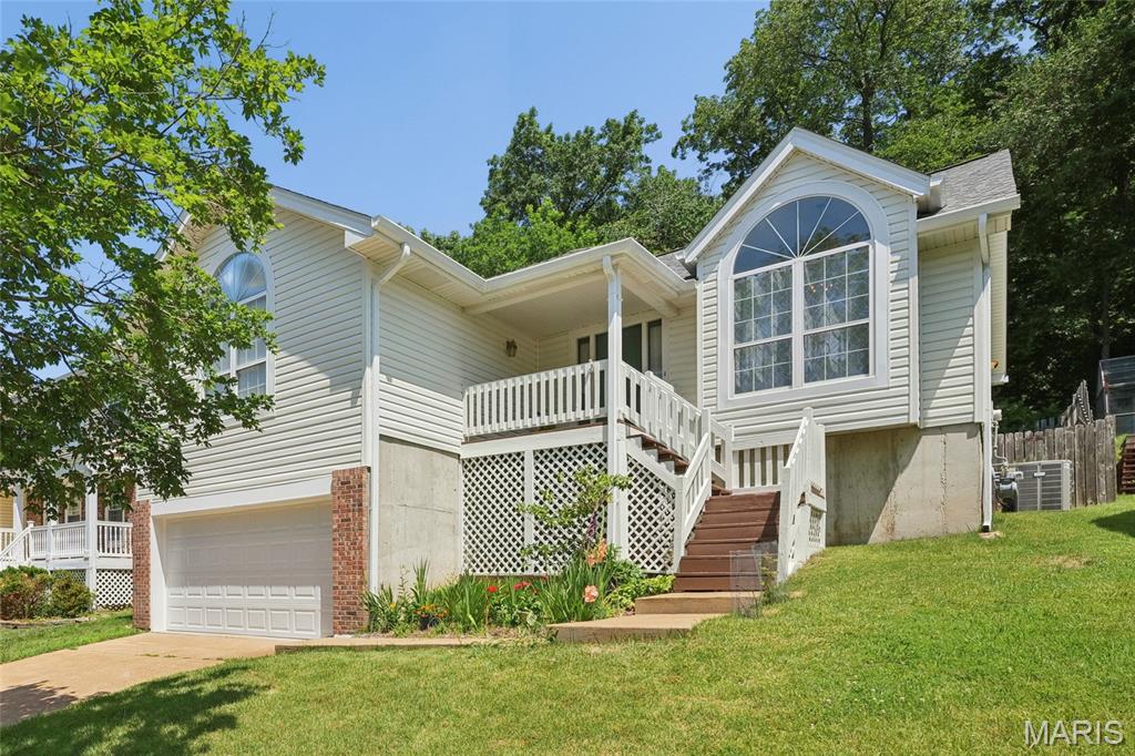 Great Ranch home in Parkway School District!  As soon as you walk in the front door you will notice the beautiful windows and all of the natural light that is shining in. Open floor plan with Vaulted Great room has a wood burning fireplace, ceiling fan & new skylights with remote controlled honeycomb shades allowing you to control the light that is let in!  Vaulted Formal dining/living room with space for whatever you need!  Kitchen is vaulted as well with a planning desk, a great place to prepare the weeks agenda!  Dining area with oversized windows looks out to the back yard. Large Primary bedroom with walk in closet & ceiling fan.  Primary bath with double sinks. Two additional bedrooms share the hall bath.  The lower level is finished with a family room and two additional rooms that would make a great home office or exercise room.  Back yard backs to trees offers space for a garden, firepit, ect...  New siding, roof, gutters & downspouts, garage door, and skylights in 2025.  Front porch was just repainted May 2026. Newer HVAC system.