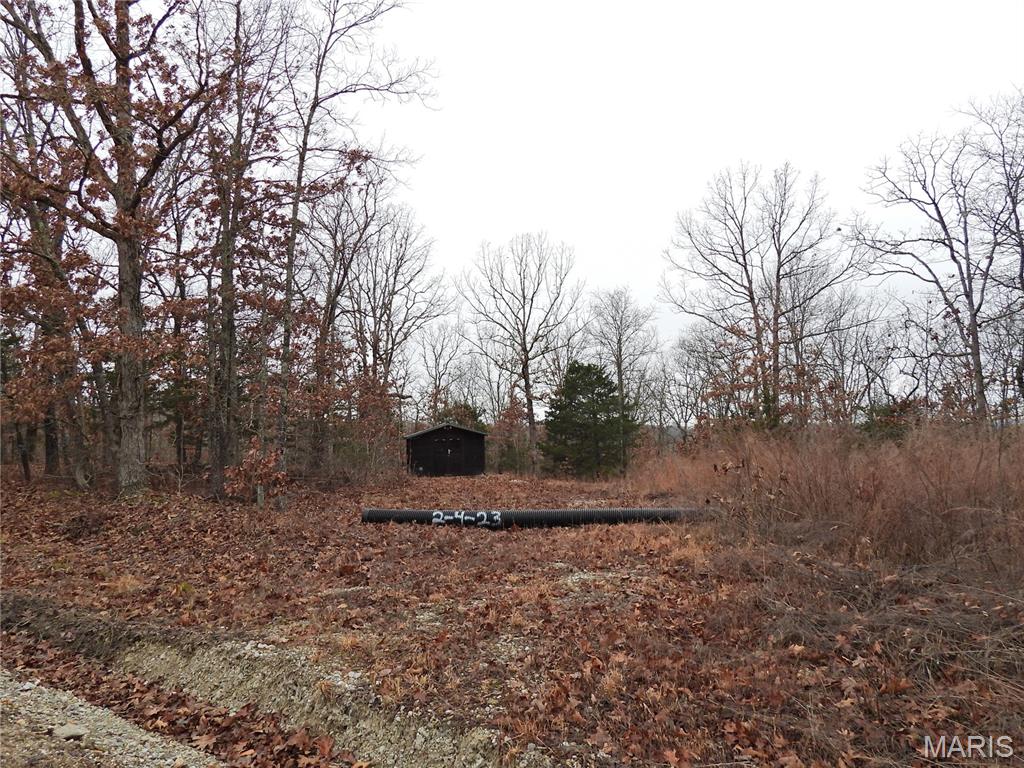 Discover the ultimate outdoor retreat with this stunning 22-acre parcel of land, perfectly situated for hunting enthusiasts and nature lovers alike. Located within a short drive of some of Missouri's most beautiful conservation areas, this property offers unparalleled access to outdoor recreation and natural beauty. Imagine owning your own slice of the Ozarks, where you can escape the hustle and bustle of city life and immerse yourself in the tranquility of the wilderness.

This property features a well-maintained hunting shed, providing a comfortable and convenient base for all your hunting expeditions. The terrain is gently sloping, making it easily walkable and accessible for a variety of outdoor activities. 

Located within 10 miles of Meramec Spring Park, Crooked Creek Conservation Area (337 acres), and Woodson K. Woods Conservation Area (5,658 acres). Don't miss this incredible opportunity to own your own piece of Missouri's natural beauty. Survey available.