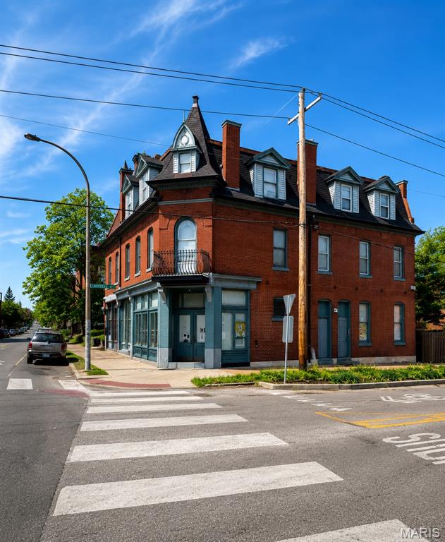 Immediate stream of income. Beautiful mix-use property. 5 residential units and 1 commercial space. Commercial space is a daycare on a lease paying $1250 per month. The 5 residential units bring in another $3,395 per month. There is 1 large efficiency unit, 1 one bedroom lofted unit, top 2 floors is a massive 2 bedroom townhome (a must see) and 2 two-bedroom townhouse units. Great back-yard courtyard with brick and landscaping. There are 5 parking spaces off street and plenty on on-street parking. Every square foot has central air and forced air heat. All units have w/d hook-up and some have fireplaces. All units occupied with long term, responsible tenants long term tenants.3 Tenants are Section 8. Do not let this property pass you up. This is not a typical building in the area. Shows well. Do not disturb tenants.