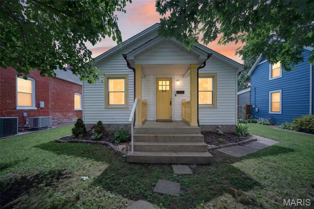 Welcome to this adorable 2 bed, 1 bath bungalow that is chock full of charm and only a few minutes' walk from Historic Main Street! This one screams home sweet home before you even get inside with thoughtful landscaping and a picturesque front porch. The charm continues inside in the bright, welcoming living room and through the arched doorway to the kitchen with custom tile backsplash, antique white cabinetry, hard surface countertops, and stainless steel appliances! Enjoy your morning coffee and a great book in the massive sunroom! This home offers two large bedrooms and a full bath with custom tile and beautiful stained glass. The backyard is what will make you the envy of your friends all summer long. Imagine the BBQs hosted off the custom brick patio with tons of level space for activities in the yard and vegetables from the garden! This home also boasts an oversized detached 1-car garage, a massive 4 car parking pad, and a shed for storage or hobbies! Home has been updated with an architectural shingle roof (3/2025)! With its prime location and chic features, this one isn't going to be around long. Schedule your private showing today!