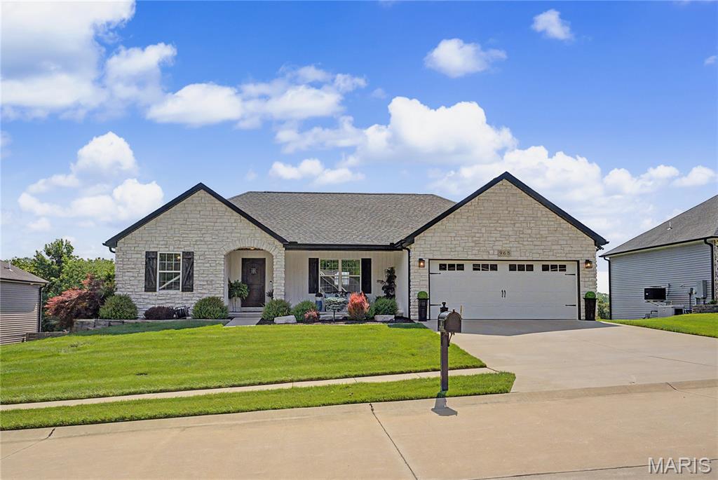 Come see this beautifully maintained six-year-old ranch home in the heart of Cape Girardeau.  The open split floor plan offers 3 bedrooms, 3 baths, and plenty of flexible living space. The main level features approx. 1700 finished sq ft to include beamed vaulted ceilings, granite countertops, wood, and tiled floors.  There is an additional 700 finished sq feet on the walk-out lower level, which includes a family room and bath, with potential for a fourth bedroom, home office, or guest suite.  Ample storage in the extra-large John Deere room.
You'll love the beautifully landscaped yard, the covered deck, and the recently fenced back yard, ideal for relaxing, entertaining, or enjoying the pets and play.