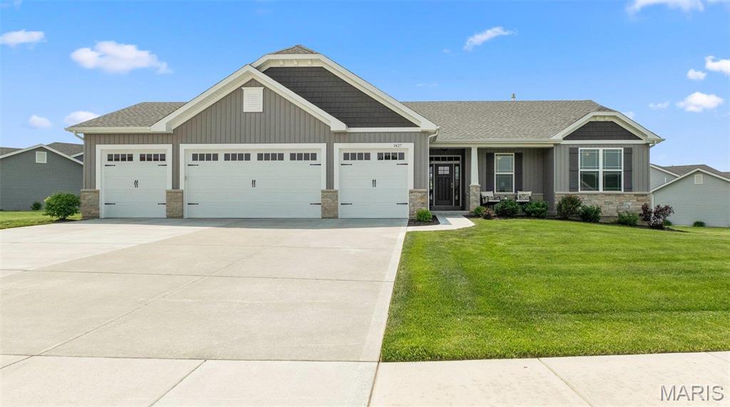Welcome to a Fabulous TR Hughes well crafted Custom Home with Tons of Upgraded Features...The first thing you will notice is an Incredible 4 Car, Yes, 4 Car 2ft Extra Deep Garage with 8 Ft Tall Carriage Style Insulated Doors and Windows.  As you enter your New Home you'll Greatly Appreciate the Very Open Floor Plan Boasting 9 Ft Ceilings Throughout in addition to Soaring Vaults & 5" White Base Trim.  Your Huge Kitchen is A Chef's Delight, Inviting and Perfect for Entertaining Featuring Huge Center Island, Granite Countertops, Stainless Appliances, Lots of Can Lighting, Upgraded 42" Staggered Cabinetry. Let the Light Shine in the extra Transom Windows over the Front Door and Main Floor Windows.   Open Stair to Lower Level with Iron Spindles. Large Look Out Windows in LL makes it easy to construct a 4th or 5th Bedroom.  Fully Sodded 1/2 Acre Yard w Irrigation System. DON'T FORGET the Maintenance Free Composite Deck that was added in 2022 and the Metal Black Fence that was added in 2022! MAKE THIS HOME YOUR FOREVER DREAM HOME!!