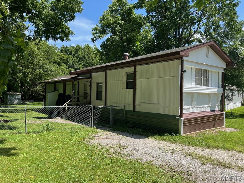 Move-in ready single-wide manufactured home featuring fresh updates throughout! This well-maintained home offers new flooring, fresh interior paint, and a bright, welcoming feel. The fenced front yard provides a great space for pets, children, gardening, or simply relaxing outdoors. Whether you're a first-time buyer, looking to downsize, or searching for an affordable investment, this home is ready for its next owner. Don't miss the opportunity to own this updated home at a great value!