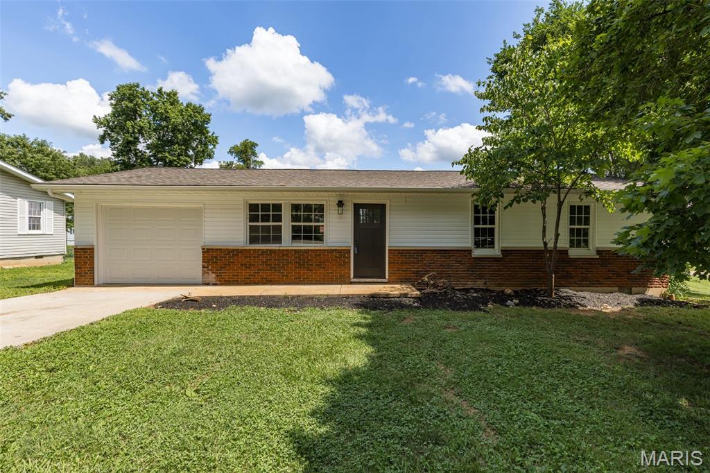 Welcome home to this beautifully updated 3-bedroom, 1-bath residence in the heart of Bonne Terre! From the moment you step inside, you'll appreciate the tasteful modern upgrades that create a bright, inviting atmosphere while maintaining a warm, comfortable feel.

The thoughtfully renovated interior features stylish finishes, updated flooring, contemporary fixtures, and a refreshed kitchen and bathroom designed for both everyday living and entertaining. The functional floor plan offers comfortable living spaces and three well-sized bedrooms, making it an excellent fit for a variety of lifestyles.

Outside, you'll find a spacious fenced backyard that's perfect for pets, play, gardening, or hosting. The attached garage provides convenient parking, additional storage, or space for hobbies.

Conveniently located near local schools, parks, shopping, and everyday amenities, this move-in-ready home offers the perfect combination of modern updates, comfort, and convenience. Don't miss your opportunity to own this beautifully refreshed Bonne Terre gem—schedule your private showing today!