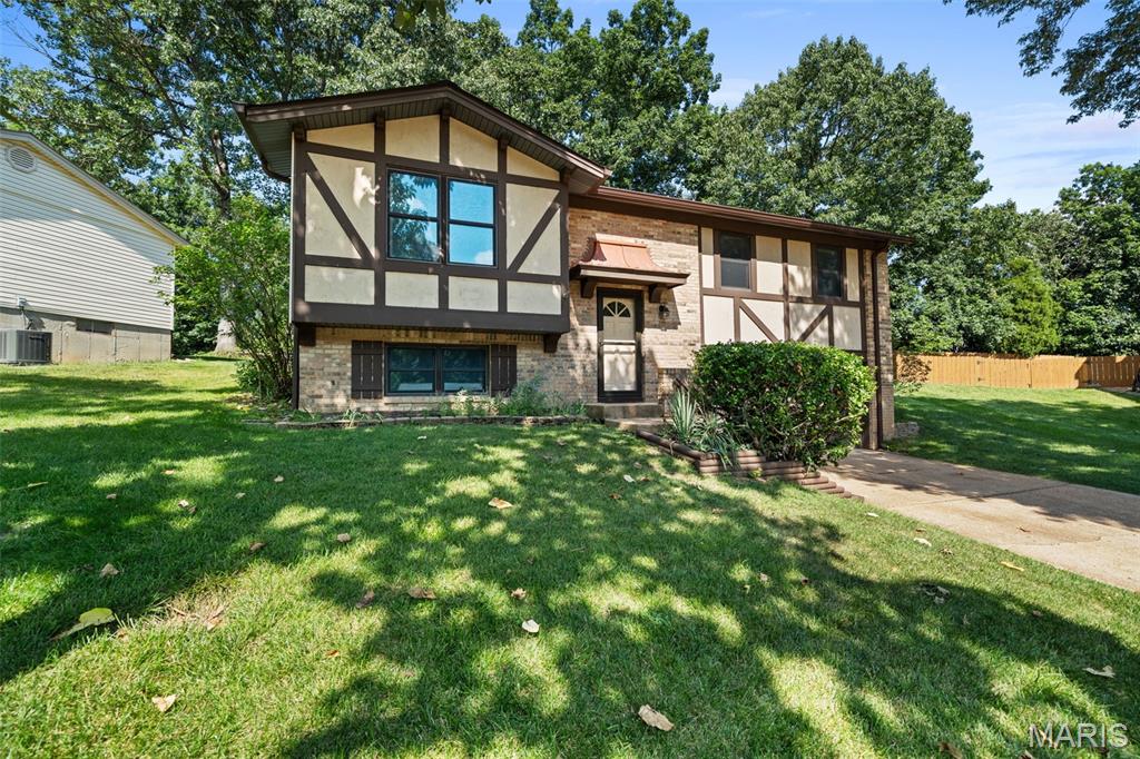 Welcome Home! Nestled on a quiet cul-de-sac, this charming split-level proves that great things really do come in smaller packages. Freshly painted throughout and featuring a beautifully renovated kitchen, this move-in-ready home blends today's updates with the opportunity to make it uniquely yours. Thoughtfully designed for comfortable everyday living, its inviting spaces are warm, welcoming, and filled with potential. Step outside to your private patio and backyard—perfect for morning coffee, summer barbecues, gardening, entertaining friends, or simply unwinding at the end of the day. Ideally located just minutes from shopping, dining, parks, schools, and major commuter routes, you'll enjoy the perfect balance of comfort, convenience, and value. Whether you're buying your first home, downsizing, or searching for a place to make your own, this delightful gem is just waiting for YOU!