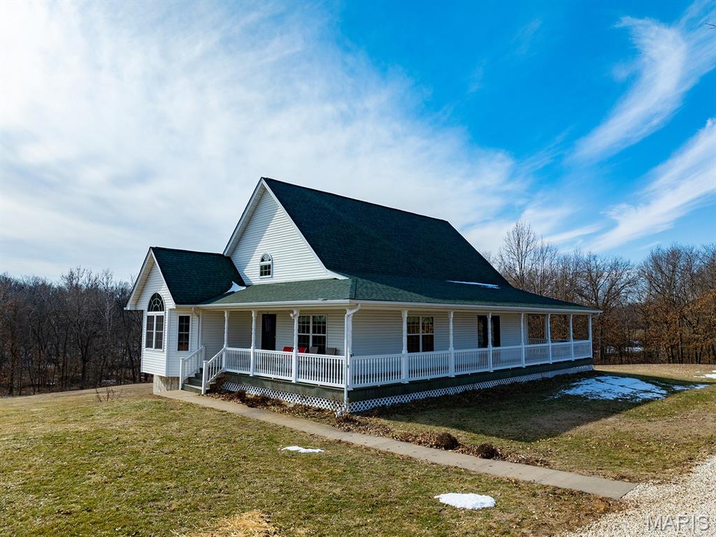 Welcome to an Extraordinary, Quality Built and Religiously Cared For Home!  YOU will find a Perfect Combination of Country Living while Relaxing on the Composite Wrap-Around Deck as the Morning Sun Unveils the Wide-Open Vistas and again in the Evening Quietly Reflecting on all of God's Creation as the Sun sets!  An Excellent Blend of Privacy and Comfortable Living Surrounded by Nature's Beauty!  Step inside to a Spacious Open Floor Plan with Beautiful Oak Stairs, Thick Natural Hardwood Floors and Ceramic Tile Floors along with Extensive Natural Lighting in Each of the Oversized Rooms.  A Grand Living & Formal Dining Combination along with a Huge Country Kitchen, Extensive Counter Tops, a Walk-In Pantry and a Perfectly Situated Island are all a Chef's Delight!  Make sure YOU pause in the Breakfast Nook to also View the Scenic Wooded area and Year-Round Creek which Appears to be only a few Steps Away.  Yes, Every Detail has been Carefully and Purposely Designed Including the Spacious Master Suite and Bathroom where YOU will also see Panoramic Views of this Country Paradise.  Yes, a Beautiful and very Spacious HOME on 8.7 Surveyed Acres of PEACEFUL COUNTRY LIVING surrounded by Picturesque Views Under the Heavens!  Additional sought after Benefits include a Low Cost Energy Efficient, Oversized 5-Ton GEOTHERMAL Heating & Cooling System along with the Historically Reliable RCEC Electric Service AND High Speed FIBER OPTIC INTERNET!  Take a Look at the FULL Basement with the 9 Foot Tall Ceilings and YOU'LL quickly see the High Quality Construction thru-out including the Large Storage Area, a Workshop Area, a Roughed-In Full Bathroom, the GEOTHERMAL System, along with a New Hot Water Heater and a Brand New 48 Inch Wide Walk-Out Basement Door with Brand New Windows all along the entire Southern facing side!  YES, a blank slate to create YOUR very own ADDITIONAL FURNISHED LIVING Space!  As it's often said; This is a "Rare Opportunity to Own YOUR Little Slice of Heaven"!   Do You Enjoy growing YOUR very own vegetables?  Yes, a huge GARDEN is ready for planting and the oversized GARDEN SHED/POLE BARN available for Toys and Equipment.  So NOW, may be YOUR Time to take a Faithfull Step into YOUR New Home since All of this is Possible!  Please Know that Sellers Prefers a Minimum of 24-Hours Advance Notice for all Showings.  Qualified Buyers Please call Listing Agent to Schedule an Appointment or with any Questions.  Thank you!
