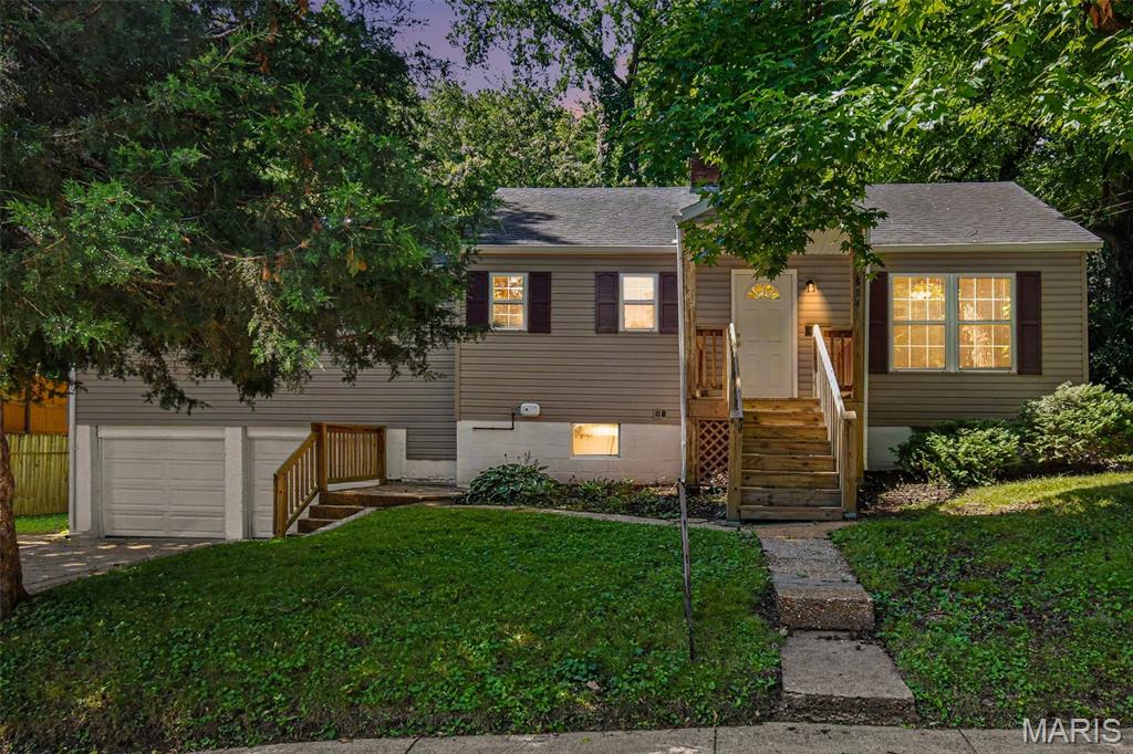Charming Webster Groves ranch situated on an oversized .31-acre lot in a highly desirable neighborhood! This 3-bedroom, 1-bath home offers over 1,200 sq ft of comfortable living space with hardwood floors, abundant natural light, and a functional open layout. The spacious living room features a cozy fireplace, while the eat-in kitchen provides ample cabinet and prep space. Enjoy the convenience of a full basement, detached 2-car garage, and a large backyard perfect for entertaining, gardening, or relaxing outdoors. Located in the award-winning Webster Groves School District with easy access to parks, shopping, restaurants, and major highways. A wonderful opportunity to own in one of St. Louis’ most sought-after communities!