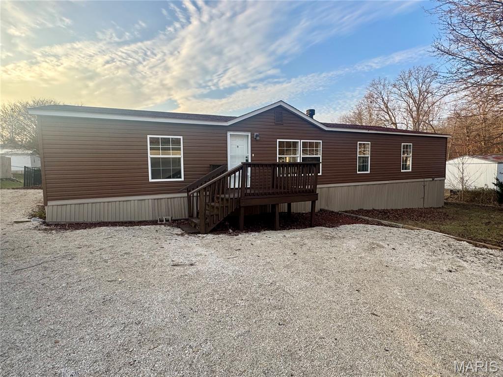 This 1680 square foot mobile home in Troy offers a spacious & functional layout. The home features 3 bedrooms & 2 full bathrooms, along with a large living room highlighted by a wood-burning fireplace. Recent updates include new flooring, fresh paint, & updated finishes throughout, making this property truly move-in ready. Enjoy a nice backyard & added peace of mind with a new electric furnace and new water heater. A great opportunity for comfortable, affordable living in a convenient Troy location.