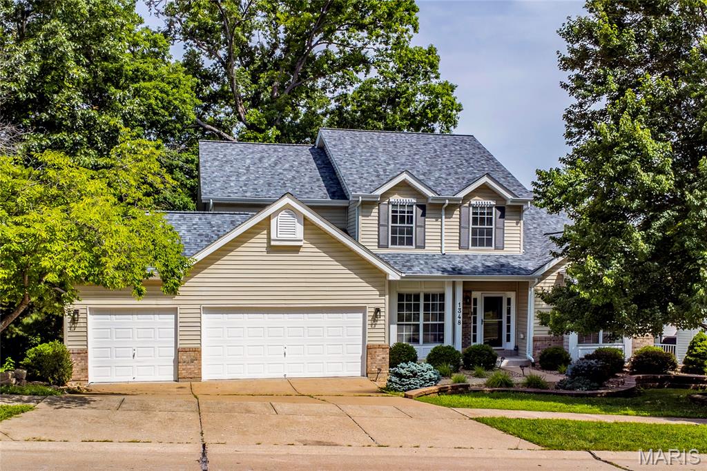 Open Sun, 7/5, 11am-1pm. Welcome to 1348 Richland Meadows Drive, a beautifully updated 1.5-story home in a fantastic Ballwin location. Tucked into a peaceful setting with a wooded backyard where deer are often seen, this home offers the perfect blend of privacy, comfort, and convenience.

Step inside to a bright, open floor plan featuring a huge living room with a cozy fireplace, creating the ideal space for relaxing or entertaining. The updated kitchen offers a fresh, modern feel with stylish finishes, granite countertops, stainless steel appliances, and plenty of cabinet space.

The standout feature is the main-floor primary suite, complete with a luxury bath and an enormous walk-in closet. Main-floor living is made even more convenient with laundry nearby and generous living spaces throughout.

Upstairs, you’ll find additional bedrooms and bathrooms, giving everyone room to spread out. The walk-out lower level offers excellent storage and future finish potential. Outside, enjoy the multi-tiered deck overlooking the wooded backyard - a peaceful place to enjoy morning coffee, evening sunsets, and frequent visits from deer.

Located near shopping, restaurants, parks, schools, and major routes, this home combines newly updated finishes, a great location, a spacious layout, and a beautiful natural backdrop.

Move-in ready, beautifully refreshed, and located in one of Ballwin’s most desirable areas - this is one you won’t want to miss.