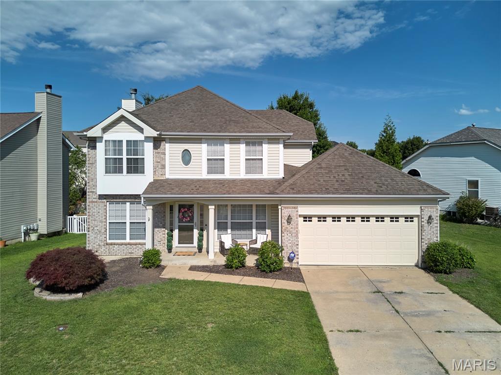 This beautiful 2 story is turnkey ready and conveniently located in the Winghaven Community, between Hwy 364 and Hwy 40/64 and close to major employers like Mastercard and Citi. This home has been thoroughly updated since 2023 and is perfect for entertaining. Entering the front door, you have a refreshed foyer with a beautiful staircase and open to the living and dining rooms. Down the short hall is an updated half bath. The updated kitchen features granite countertops and a coffee bar, and the adjacent breakfast room has a bar window bump out to the backyard. The family room is spacious with a gas fireplace and has a large bay window bump out as well. You also have a mud room from the garage entrance which leads to the main floor laundry. On the second floor you have a primary suite with a coiffured ceiling and an additional A/C window unit. The primary bathtub features a separate shower and tub for relaxing, with a double sink vanity and walk in closet. The additional three bedrooms are good sized and two have walk-in closets. There is also a second full bath upstairs. In the basement, you have a finished office with glass French doors, a rough in, and lots of storage space. The level backyard is fenced with a large patio and the property also includes a sprinkler system. This home comes loaded with recent updates, including waterproof laminate floors throughout the entire first floor and upstairs bedrooms. You’re close to all the Winghaven amenities, including the golf course and dining, and are within walking distance of Crossroads Elementary School in the Wentzville School District. Come see all the great features in person!