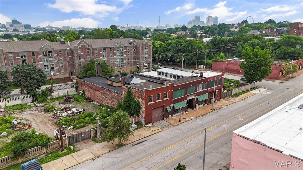 Prime Lafayette Ave Opportunity | 11,360 SF architectural Gem + 8 Vacant Lots

Welcome to 2701-2729 Lafayette —an architecturally striking 11,360 square foot building bursting with potential in one of St. Louis’ most vibrant, walkable neighborhoods. Just one block from Lafayette Square, this stunning structure sits at the heart of a rare, multi-lot offering that includes five vacant lots on one side and three on the other. 

With its soaring ceilings, ornate detailing, and grand presence, the space is a dream canvas for visionary developers, entrepreneurs, and hospitality professionals. Imagine an upscale event venue, boutique hotel, wedding hall, or restaurant and patio concept—with ample room to incorporate on-site parking and lush outdoor entertaining areas thanks to the adjacent lots.

Alternatively, the footprint and location are ideal for residential development—whether luxury townhomes, single-family residences, or a boutique apartment conversion. The building’s interior features stunning original elements that can be creatively repurposed or restored, offering character you simply can’t recreate.

Zoned for flexibility and surrounded by sought-after architecture, local amenities, and booming development, this property presents a one-of-a-kind opportunity to make a lasting mark in the heart of St. Louis.