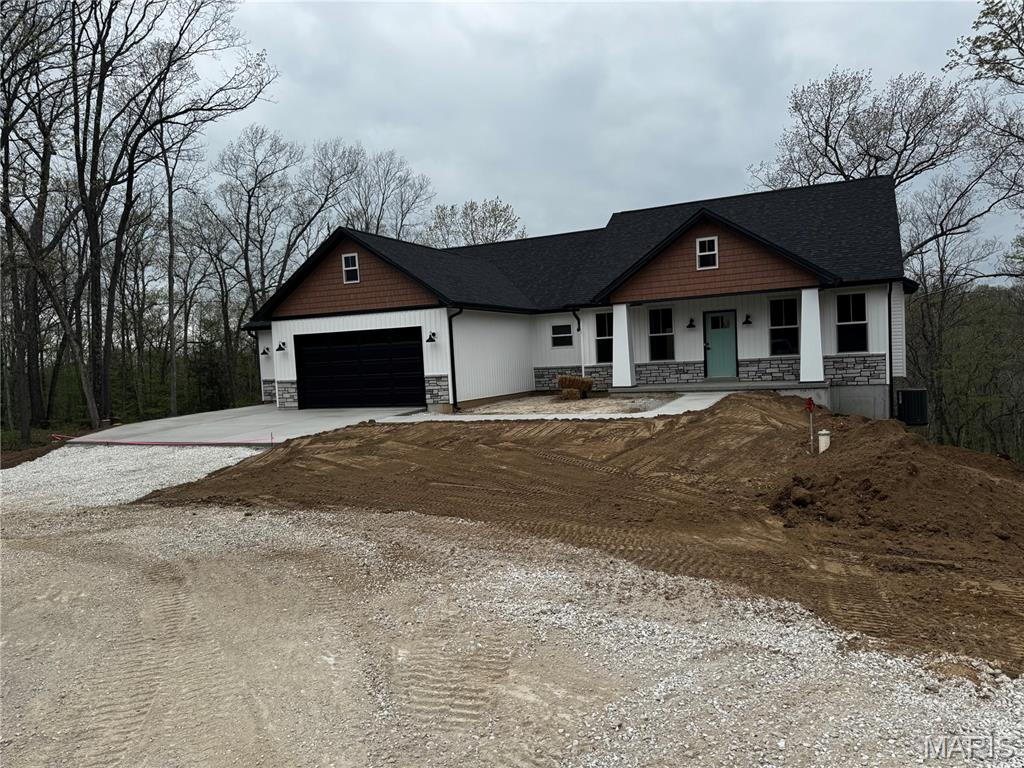 Custom built ranch.  please note that sales price does not include custom tile work, flooring, upgraded lighting and appliance package.  Full custom tile work in kitchen area. pantry, bathrooms by buyer.  Custom millwork with complex interior trim.  Appliances are special order by buyer as well