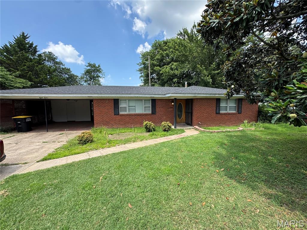 Check out this 3 bedroom and 2 bath brick home located in Kennett! The property has large living spaces including a large bonus area on the backside of the house. The property is over 1,700 square feet. There have been several updates including paint, flooring, and a newer roof. Come check this one out!