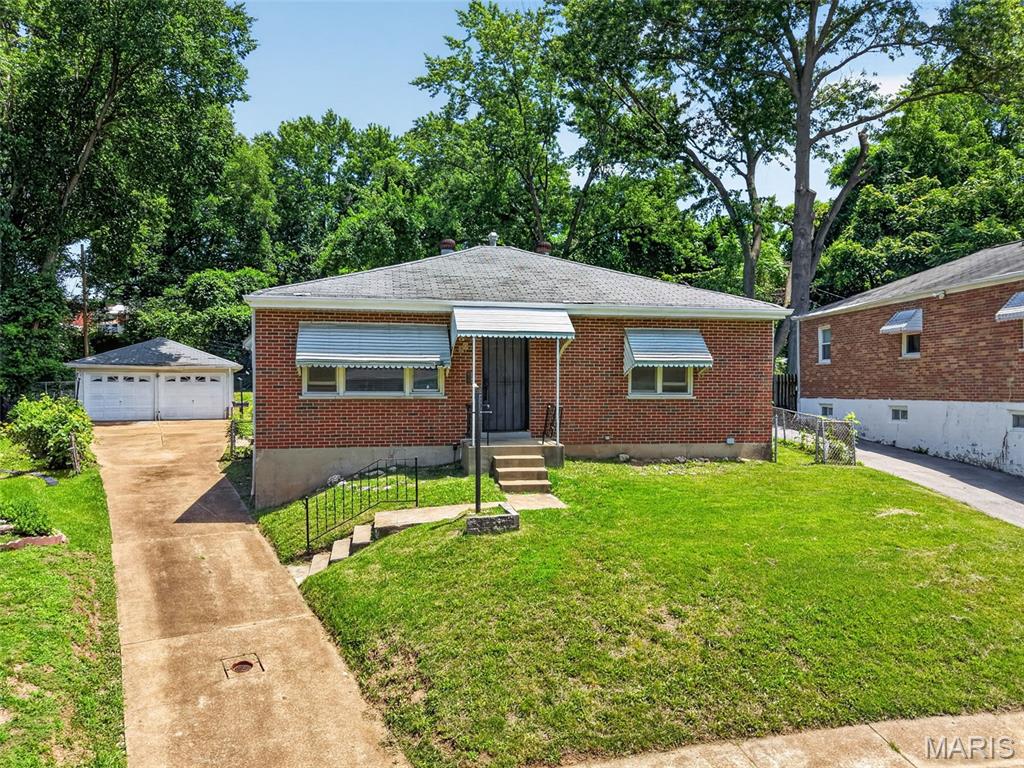 Promising Brick Ranch which requires a little fix up effort! The home is Nestled on a private and peaceful Cul De Sac. Three plus bedrooms, a spacious 2 car garage, partially finished basement featuring a big wet bar that's ideal for entertaining guest. The Interior has been freshly painted, there's wood veneer floors throughout, six panel doors, a Family Room with a Wood Burning Fireplace. This home is close to public transportation and less than a ten minute drive to three shopping locations such as Buzz Westfall Plaza, Jennings Shopping Center,and the Walmart Super Center. Schools serving this home are incredibly close; ranging from 0.1 to 0.5 miles...within walking distance! This is a very "Walkable Neighborhood" with lots of Greenspaces such as Koeneman Park which is 0.5 miles from your front door. This park has a Big Playground, Large Pavillion for Family Reunions and a Well Stocked Lake for Fishing. The home just requires a tad bit of TLC to become the "Gem" of the neighborhood! The home is being sold AS-Is; the Seller will not provide any reports or perform any repairs, including municipal occupancy requirements. Your offer will be submitted on a special sales contract and must include a written pre-approval from a reputable mortgage lender and a minimum of $1,000. earnest money. No Seller financing, escalation clause, sight-unseen offers