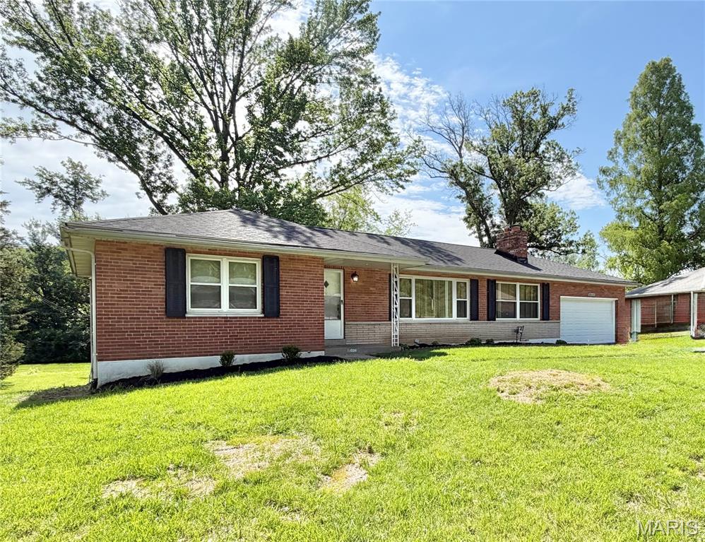 This charming brick ranch offers the perfect blend of character, space, and functionality. Beautiful hardwood flooring flows throughout the main level, featuring a spacious living room, separate dining room, and a cozy family room anchored by a wood-burning fireplace. An adjoining flex space provides the perfect spot for a breakfast table, home office, reading nook, or hobby area. The kitchen offers an abundance of cabinet and counter space, stainless steel appliances, and plenty of room for everyday living and entertaining. Two generously sized bedrooms and a charming full bath complete the main level.
The finished walk-out lower level expands the living space with a bright and inviting layout enhanced by a large picture window that fills the area with natural light. Featuring a second full bath, bar area, sleeping space, and multiple flex areas, the lower level offers endless possibilities for entertaining, guests, a home office, or recreation. Outside, you’ll appreciate the timeless brick exterior and oversized 2-car garage. With flexible living spaces on both levels and classic charm throughout, this home is ready to welcome its next owner.