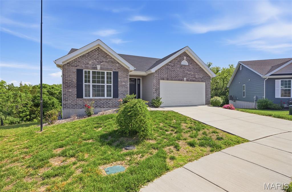 Discover the charm and elegance of this like-new ranch-style home nestled in a tranquil cul-de-sac, offering the perfect blend of comfort and modern living. As you step inside, you are greeted by an expansive open floor plan that seamlessly integrates the living, dining, and kitchen areas, bathed in natural light that enhances the inviting atmosphere. The well-designed layout features a divided bedroom plan, ensuring privacy and tranquility among the three spacious bedrooms. And lets not forget about the attached garage and main level laundry for that added convenience.
Retreat to the master suite, complete with a luxurious en suite bathroom that offers a serene escape at the end of the day. The additional two bedrooms are generously sized, perfect for family members, guests, or a dedicated home office. Convenience is key with a main floor laundry room, making chores a breeze.
Step outside to your private outdoor oasis, where a lovely deck and patio await, ideal for entertaining or simply enjoying the peaceful surroundings. This property backs to a beautiful common ground wooded lot, providing a picturesque backdrop and ample opportunities for outdoor activities and exploration.
The home's unfinished walk-out basement boasts an egress window, offering significant potential for additional living space, whether you choose to create a cozy family room or add another bedroom to accommodate your growing needs.
With its thoughtful design, prime location, and modern amenities, this home is not just a place to live - it's a lifestyle waiting to be embraced. Don't miss your chance to make this idyllic property your new home. Schedule a viewing today and experience the perfect blend of comfort and convenience!
This home does qualify for USDA financing and no money down options.