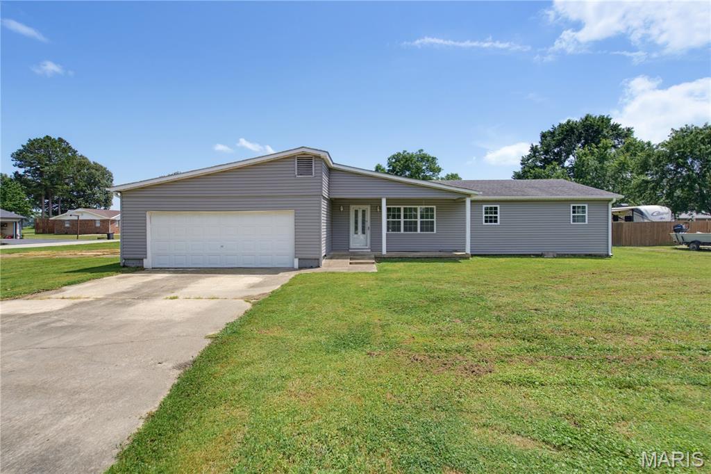 Very nice turnkey 3 bedroom 2.5 bath with so many updates.  The roof has been replaced, new windows, siding, fascia, gutters and AC to start this one on just the outside.  This home also has everything new insides as well.  New paint, flooring, ceiling fans, and lights have all been upgraded.  This a county home with small town neighborhood charm.  Try not to miss this one, improved house within budget!