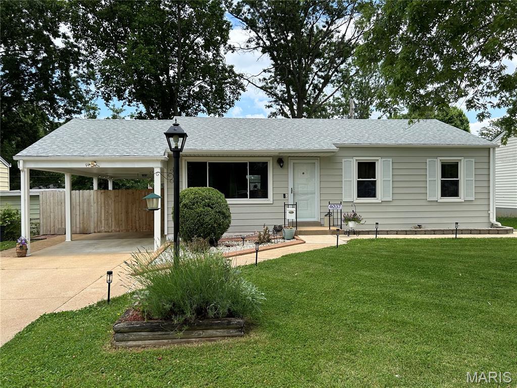 Beautifully updated 3 bedroom/ 2 bath home with original hardwood floors in bedrooms and newer vinyl hardwood plank flooring in spacious living room / kitchen combo. This open concept is one of a kind! Numerous improvements during ownership to include: new kitchen appliances, garbage disposal, Kohler undermount sink, new Furnace and A/C, ceiling fans & lighting throughout. A partially finished lower level includes a large rec room, cozy area for visiting, split full bath with shower, and laundry room/utility area. A privacy wall created on the carport allows a cozy covered patio area overlooking a fully fenced backyard with storage shed. Come see this beautiful home and enjoy the private exterior views through the newer Pella Windows. Great location: Plenty of driveway and street parking, quiet yet quick easy highway access.  Limited viewing of home: Showings begin with a 3 day weekend, Friday, June 12th through Sunday, June 14th.  WEEKENDS ONLY are available due to owner's 'work from home' requirements. Please schedule viewing in advance.