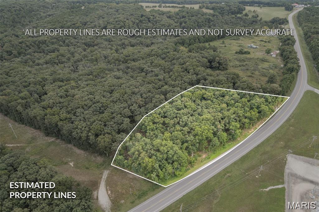Build your dream home in the Farmington area now.  Located just 6 miles from Farmington on Hwy 32.  Make this choice your best with zero restrictions on 3.05 raw acres.  New survey to be uploaded soon with additional pictures.