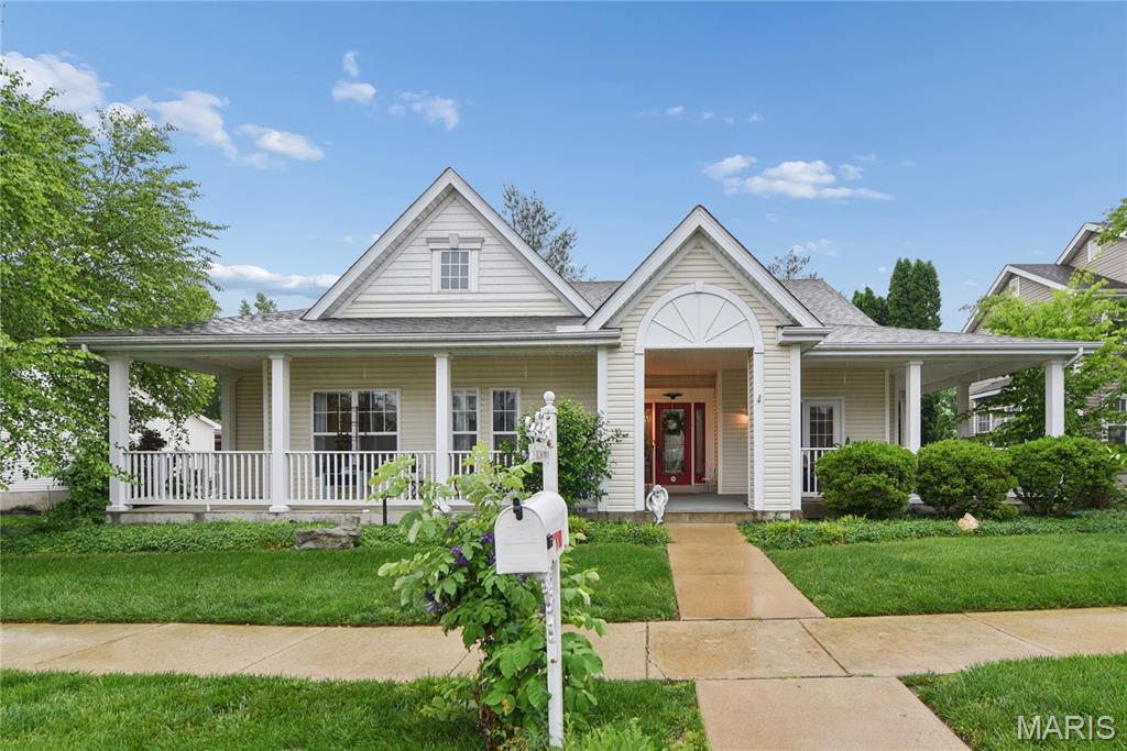 Beautiful ranch in Winghaven with 2327 sf on main level. The main level has hardwood floors throughout along with 9 ft ceilings. There are 12 foot ceilings in great room with fireplace, built in shelfing and updated wall of windows with slider to  deck, private and perfect for indoor/outdoor entertaining. Upper windows have power blinds. Seller just installed new carpeting over the hardwood floors for their personal preference, the hardwood floors are still under the carpet. Formal dining room with coffered ceiling and French doors leading out to the wrap around porch. Huge master suite with luxury bath with jet tub, double vanity and separate tub. The third bedroom was used as home office and has glass french doors off entry with transom above. Oversize 2 car garage offers lots of storage. Full basement has a finished full bath. Seller just installed sprinkler system last year as well to help keep yard lush and green.