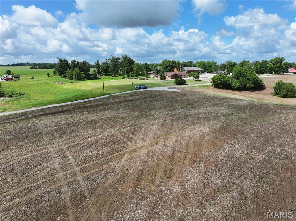 Discover the perfect blend of country living and convenience with this beautiful tract located just minutes from town and situated on a blacktop county road right off Highway 51. Whether you’re looking to build your dream home, start a small hobby farm, or invest in versatile acreage with endless potential, this property checks all the boxes.

The property will be surveyed prior to closing, giving buyers clearly defined boundaries and peace of mind. With no restrictions, you’ll have the freedom to use the land how you choose — from livestock and gardening to building a shop, barndominium, or custom home.

Utilities are readily available with public water located along the county road, electric nearby, and newly installed Spectrum internet lines providing access to high-speed internet in a rural setting. The combination of accessibility, infrastructure, and location makes this property a rare find.

Enjoy the privacy and open space of the countryside while still being close to shopping, schools, dining, and everyday amenities. Properties with this kind of flexibility and convenience are hard to come by — don’t miss your opportunity to own a great piece of ground with unlimited potential.