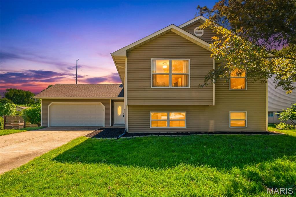 Welcome home to this beautifully updated split-level featuring 4 bedrooms and 2 full baths with stylish updates throughout! The spacious kitchen offers granite countertops, an eat-in dining area, and walks out to a wood deck perfect for morning coffee or summer entertaining. The finished lower level includes an additional bedroom and full bath along with a cozy entertaining space highlighted by a wood-burning fireplace. Enjoy the convenience of a 2-car garage and peace of mind with a brand new air conditioner installed in April 2026. Located in a desirable subdivision offering a community pool and clubhouse, this move-in ready home combines comfort, functionality, and great neighborhood amenities in one fantastic package!