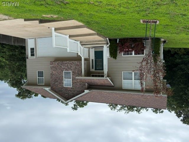 Move-in ready and exceptionally well maintained! This beautiful 3-bedroom, 3 full bathroom raised ranch-style home offers excellent curl appeal with attractive landscaping and welcoming exterior. Recent updates include a new roof, new gutters, and stainless steel appliances.  Architectural details such as bull nose corners and decorative wall insets add character and charm throughout.
The open-concept floor plan creates a seamless flow from the living room into the kitchen, making the home ideal for everyday living and entertaining. Large windows fill the space with natural light while showcasing views of the spacious backyard and scenic tree-lined setting.
The primary suite features a large walk-in closet and impressive bath with dual sinks, a jetted soaker tub, and separate shower.
The finished lower level provides an abundance of additional living space and includes a third full bathroom. With plenty of room for a pool table, bar area, game room, or entertainment space, the basement offers endless possibilities for family gatherings and recreation.
An extra-large garage provides ample space for vehicles, storage, mowers, and yard equipment.
Clean, updated, and ready for its next owner, this raised ranch combines comfort, functionality, beautiful surroundings, and exceptional space both inside and out.