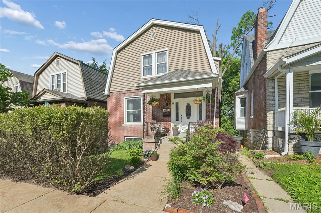 Welcome to 1115 Forest Avenue, situated on a large lot on a quiet one-way street in the popular Dogtown Neighborhood. They truly "don’t build them like they used to," and this meticulously cared-for home—built in 1907—is the perfect example. Upon entry, you will immediately feel the historic charm, highlighted by beautiful hardwood floors and high ceilings that welcome you into a spacious family room featuring a functional wood-burning stove. The living area flows seamlessly into a large, formal dining room, just off the updated kitchen. This space boasts tile flooring, stainless steel appliances, and custom maple cabinetry reaching to the ceiling. Tucked away at the back of the home is a bright sunroom/bonus room with vinyl windows that overlook the private backyard. Upstairs, you will find three large bedrooms featuring hardwood floors, tall ceilings, and large windows, along with a full bathroom. The property also includes a full, unfinished walk-out basement and a covered back patio. The peaceful backyard is fully enclosed by a wooden privacy fence, with a pathway leading to a second large stone patio and a custom-built fireplace—perfect for evening gatherings. Complete with alley access to a one-car garage, this home offers easy access to Forest Park, major highways, and all local amenities.