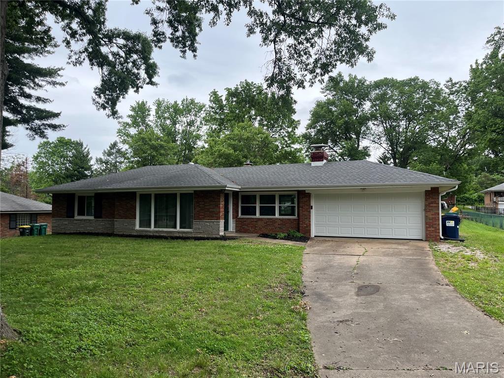 2 bed 1 bath home ready for a new owner!  This home boasts a very large yard, a full basement, a two car garage and sits on a very well kept quite street.  This will not last long!
