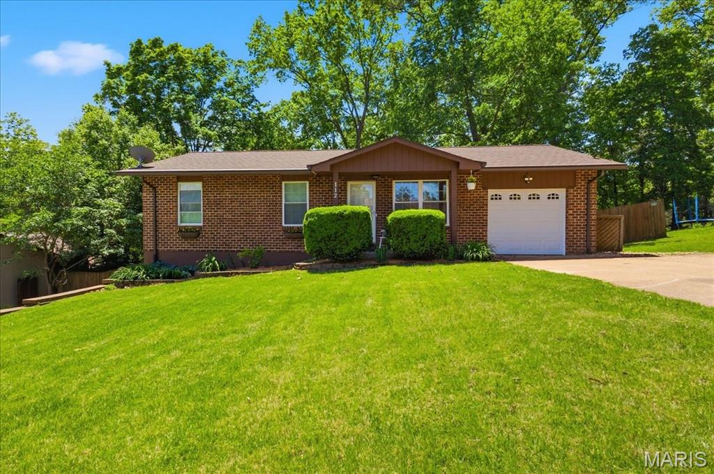 Pride of ownership is evident at every turn in this well cared for ranch in Augustine Heights! Curb appeal is A+ with FULL brick exterior, low maint. landscaping & covered front porch. Walk inside to a living room area with gleaming wood flooring, crown molding & natural light. Eat-in kitchen has a breakfast bar, dining area & is improved with SS appliances, custom cabinetry, tile flooring, solid surface counters & tile backsplash. Large family room impresses w/vaulted ceiling, woodburning fireplace w/full stone surround, skylights & access to the backyard via sliding glass doors. 3 bedrooms on the main level share 2 full bathrooms. Walk-out lower level adds to your useable square footage & includes a laundry area, multiple rooms for storage, workout room & more. Out back is your own oasis w/large, fully fenced yard lined with mature foliage, multi level deck w/built in hot-tub (stays with home) & more privacy than you'd expect from a traditional neighborhood setting. Recently replaced HVAC includes a heat pump, all electric utilities, walking/biking distance to The Timbers pool & recreational center, downtown Eureka & Route 66 Park.