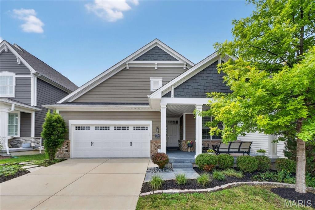 LOVELY, TURN-KEY, RANCH home, built in 2018, offers excellent space and modern living in one of the area’s most desirable, recently developed community, Main Street Crossing. 2 Bedroom, 2 full bath home featuring 1,631+/- SqFt, 9’+/- ceilings & laminate “wood like” flooring through-out (except bedrooms & office). Spacious, yet COZY, covered front porch greets you as you step inside the entry foyer. Living room boasts 12’+/- ceiling, gas fireplace w/Marble surround & recessed lighting. Fabulous kitchen offers custom cabinetry, center island w/breakfast bar, Frigidaire stainless steel appliances, Quartz countertops, tile backsplash, butler’s pantry & 12’+/- ceiling. Breakfast/dining area with 12’+/- ceiling & a sliding glass walk-out to deck allowing plenty of natural light. Primary suite with carpet, bay window & ensuite full bath with a large custom shower, double single sink vanity, private commode & large custom walk-in closet. Other bedroom with carpet, slide closet & shares hall bath with a shower/tub & single sink vanity. Laundry room & office complete the main level. Unfinished, lower-level has great potential for additional living space just awaiting your finishing touches w/8’+/- ceilings, roughed-in full bath & egress window. Outside, enjoy an AWESOME level lot with a wood deck, concrete patio & 2-car attached garage w/epoxy flooring. Within the Rockwood School District, easy access to Highway 100/Manchester Road & minutes to Wildwood Town Center, shopping, parks, dining & amenities. MUST SEE! :)
