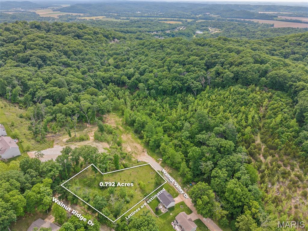 With two road fronts and all the necessary utilities already on site, this building lot is the perfect canvas for your dream home. You'll have the freedom to choose which road you'd like to face and enjoy the convenience of public water and sewer. Whether you're looking to build a cozy cottage or a spacious family home, this lot is a fantastic opportunity to make your vision a reality. This sale includes lots  37, 38, 39. Owner willing to sell individual lots at $10,000 each or buy all 3 for listing price.