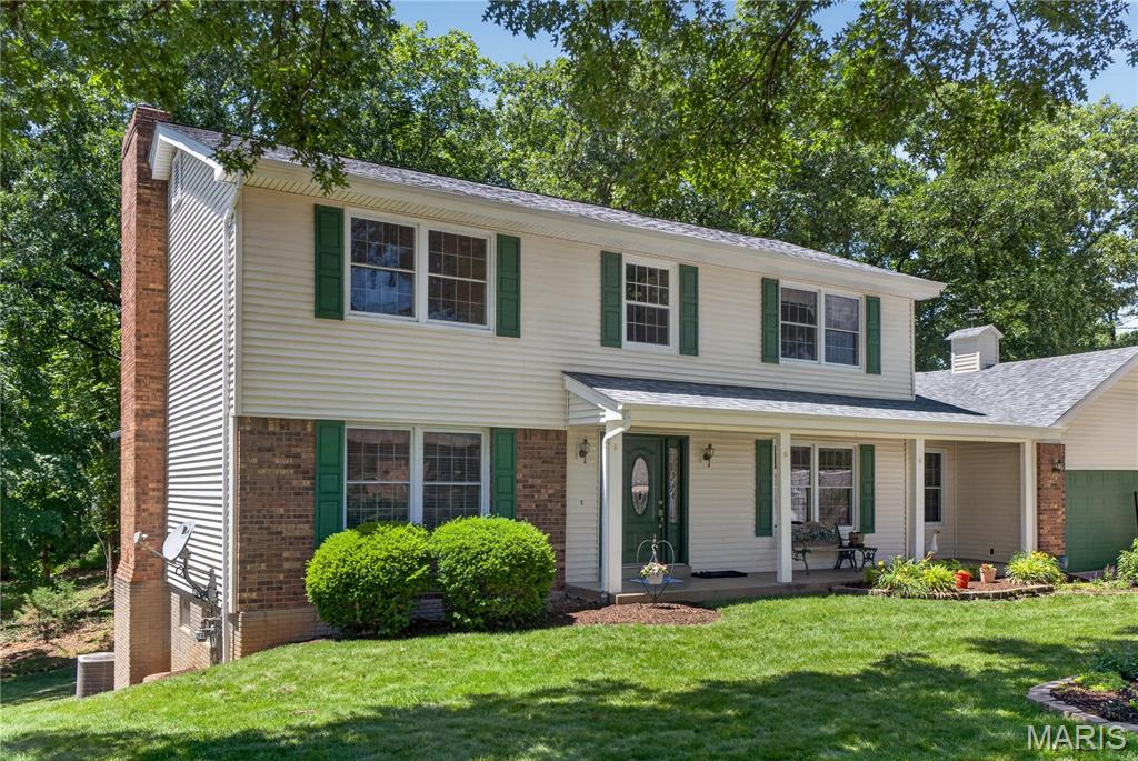 Welcome to 5311 Hamlin Ct!  This home has been lovingly maintained and all you have to do is buy it and back up the truck and move in!  Upon entering this home the buyer will find a formal dining area as well as a bonus/reading room.  In the back of the home is a large, but cozy family room with a wood burning fireplace, large windows, and built in book cases.  Buyers will love having a double oven and solid surface cooktop in the kitchen and luxury vinyl tile!  The long peninsula is great for entertaining!  From the family room walk out to the enclosed porch that leads to the park like back yard which also includes some common ground for a walk in nature or just sit and enjoy the peacefulness!  There is a main floor laundry/mud room for convenience!! Upstairs buyers will find 4 generous sized bedrooms with a primary bedroom and updated ensuite!  A trip down the hall leads to the other 3 bedrooms with a full bathroom.  The bedrooms upstairs have laminate flooring. Buyers will appreciate having an oversized garage with a man door at the back.  The partially finished lower level with a walk out is a great man cave, workout or play room!  
Roof replaced in 2023.  These homeowners have completed many significant updates and lovingly maintained this home throughout the years!