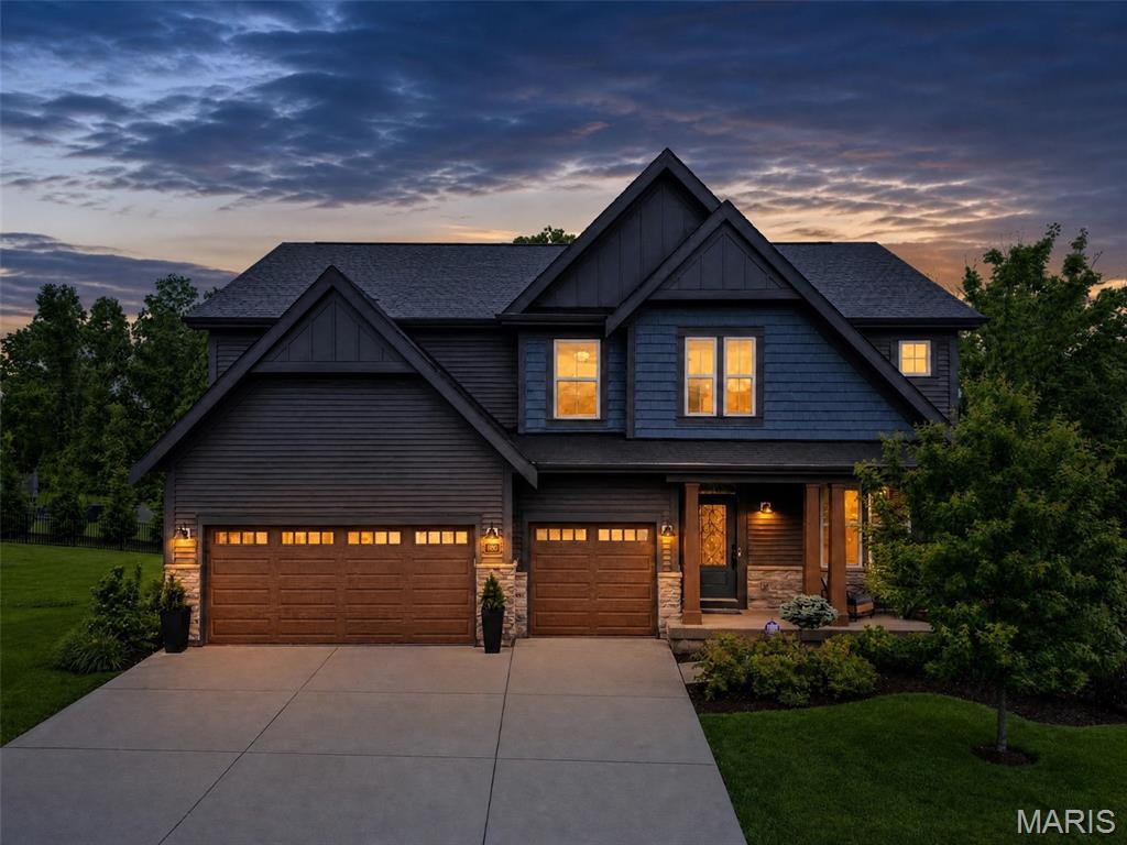Welcome home! A picture perfect landscaped lot and Southern Charm of the front porch is where stories are sure to be told and memories begin to unfold. The moment you arrive home you'll feel life naturally slow down, strategically curated living spaces designed for both luxury and everyday comfort are naturally accented by the natural sunlight flooding through the expansive windows. Every detail was chosen to create a home that feels both refined and comfortably livable - equally suited for quiet mornings, lively gatherings and the everyday moments that matter most. At the center of the home, the professionally designed kitchen includes custom cabinetry, Level 5 Cambria Quartz countertops, professional appliances and practical functionality. The living room and evening lounge both create an effortless connection within the main floor. 
The upper-level primary suite is a true private retreat with a spa-inspired bathroom, double vanities, walk-in over-sized shower and a large walk-in closet. Additional upper level bedrooms and bathroom offer space and flexibility for family and guests.  2nd floor laundry room is sure to make quick work of your laundry days. 
The finished lower level was designed to be more than just additional space - it's a place made for connection, celebration and everyday enjoyment.  Whether hosting game nights or gathering with friends to watch the big game, the inviting recreation lounge creates a warm and comfortable atmosphere that naturally brings people together.  Thoughtfully designed with flexibility in mind, the space feels both relaxed and elevated, offering the perfect extension of the home for entertaining and making lasting memories.  
The showcase ready 3 car garage is 21" deep, heated, fully drywalled & insulated with bespoke curated lighting is sure to impress the car enthusiasts of the family. 
Step outside and discover an outdoor setting that feels like a private escape from the pace of everyday life.  Designed for relaxing evenings, weekend entertaining, and peaceful mornings with coffee in hand, the outdoor living spaces invite you to slow down and enjoy the surroundings.  With exceptional upgrades, inviting spaces, and a location that offers both convenience and community, this home is more than just beautiful - It's a place where lasting memories are wanting to be made.
Be sure to check out the feature list.