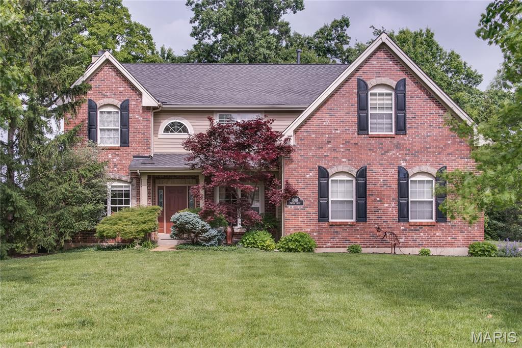 This stately 4-bedroom 3 -1/2 bath home sits high in sought after Oak Estates. LADUE SCHOOL DISTRICT. There’s handsome wood flooring throughout the main level. Entering the open foyer you immediately sense the higher-end finishes, In the office or den with handsome bright built-in shelving and cabinets with crown molding. Opposite is the formal dining room, again with crown molding elegant chandelier and Venetian plaster finished walls. The sprawling family room overlooks the tranquil rear yard and is complete with a gas fireplace cream stucco mantle and surround hearth with travertine tile hearth. The large recessed bay window provides ample natural light. The eat-in kitchen is well equipped and fit for a chef. Plenty of granite counterspace, panty, planning desk, double Kitchen Aid wall ovens, built-in microwave, dishwasher, LG French-door fridge with through the door dispenser and handy-tray door, 6-burner gas cooktop and powerful fume hood with a colorful mosaic glass tile backsplash that compliments the tile counter backsplash. All appliances are stainless steel. Cabinets are soft close including the island cabinets. Taking the landing-turn staircase to the upper level are the private living quarters, a large picture window on the turn looks over the park-like rear yard and leads to a common multi-purpose room. Second-floor laundry. The primary suite features a cathedral ceiling hanging bedside lamps and ceiling fan, his and hers walk-in closets lead to the private primary bath with lots of light, separate glass stall shower, and jetted soaking tub, dual vanities and cathedral ceiling. The second-floor hall bath features a combined tub-shower dual sink vanities. Three more bedrooms round out the second floor. The lower level is made for fun and entertainment. A large multi-purpose recreation room provides walk out access to the rear yard and hot tub. as well there is wine closed with glass door and a full bath. Unique to the house is a large, mirrored room currently used as yoga studio. Two more areas offer utility and storage areas. Outside the rear yard is a manicured private paradise with mature plantings and professional hardscape landscaping, escape in two levels either from the lower level French doors or the main level kitchen French doors, A lounging area and a pergola with a dining area offer lots of space for entertaining guests as you listen to the babbling of the multi stage ceramic water fountain. Take the garden path stairs down to the included hot tub spa. There are 3 HVAC zones and instant on hot water. Oversize 3-car garage with plenty of storage. Walking distance to Stacy Park. Close to Clayton and airport.
