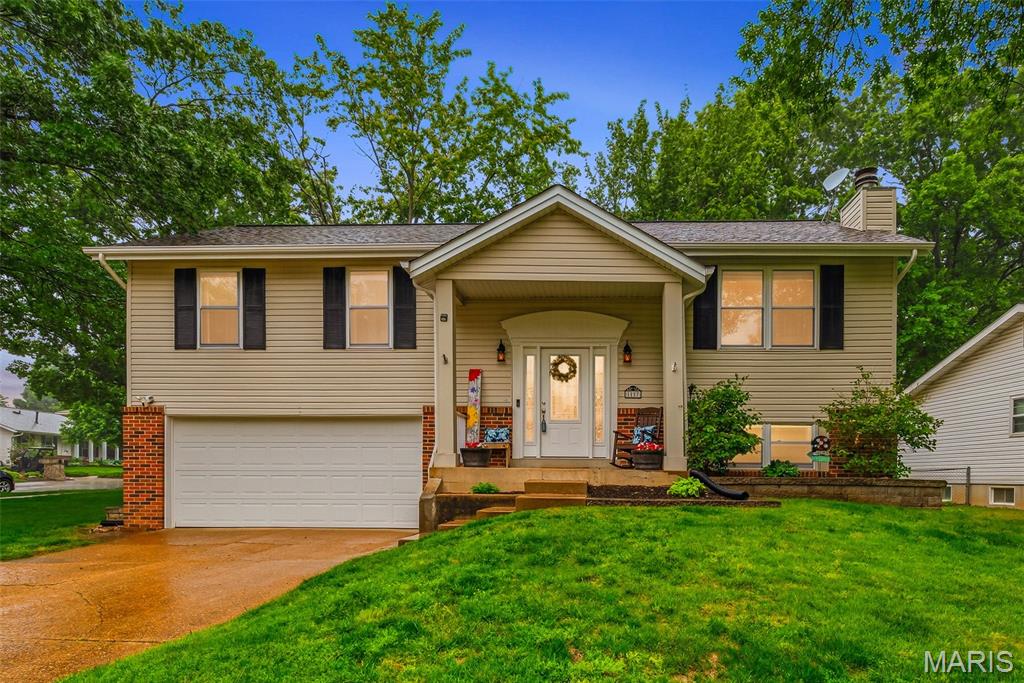 Welcome to 1117 Windyoak, nestled in a quiet tree-lined neighborhood in the award-winning Parkway South School District.  This tidy 3 bd/2 ba split floyer features a lush corner lot, neutral updates, an open floor plan, and the perfect fully-fenced backyard for your Summer soirees. The main living area of this gem boasts an impressive amount of natural light and an effortless flow from one room to the other, including the backyard deck, making it the perfect space for every day living and entertaining. Pull a stool up to the kitchen breakfast bar for your morning coffee or use it as a buffet for your housewarming barbeque!  If you love to cook, the beautifully updated chef's kitchen will delight you with gas cooking, a sizable pantry, wood soft-close cabinets, quartz countertops, storage galore, and all stainless steel appliances included.  All three bedrooms in this home are sizable with ample closet space, including the lovely Primary bedroom with an updated ensuite full bathroom and walk-in closet.  The Primary is large enough for a King bed and has a convenient bathroom layout for two people to easily juggle a busy morning routine. Heading downstairs, the cozy lower-level is the perfect place to snuggle up in front of the brick wood-burning fireplace to watch movies or the big game.  Off the lower level family room is a finished bonus room that provides true transitional living space.  Office, hobby room, playroom, additional storage?  The sky is the limit.  Speaking of storage, the adjacent laundry room has a ton of shelved space that isn't pictured, as well. Heading outside is a lush fully-fenced backyard with a sizable deck and tons of green space for gardens, pets, and playsets. Want a pool?  Great yard for it!  Bring your twinkle lights and Pinterest Boards, Buyers.  Complete with new fixtures, an oversized 2 car garage with a workbench and shelved storage galore, lovely bamboo flooring, fresh paint, professionally cleaned carpets, a freshly reglazed tub, radon mitigation, and more... this one is a complete package.  You will fall for the fabulous West County location in a tranquil setting that’s still close to everything— shopping, dining, and entertainment.  Where else can you get to both Costco and the awesome Meramec Valley river trails of Castlewood State Park in less than 5 minutes,  with some of the best public schools in St. Louis to boot?  Pure awesome!